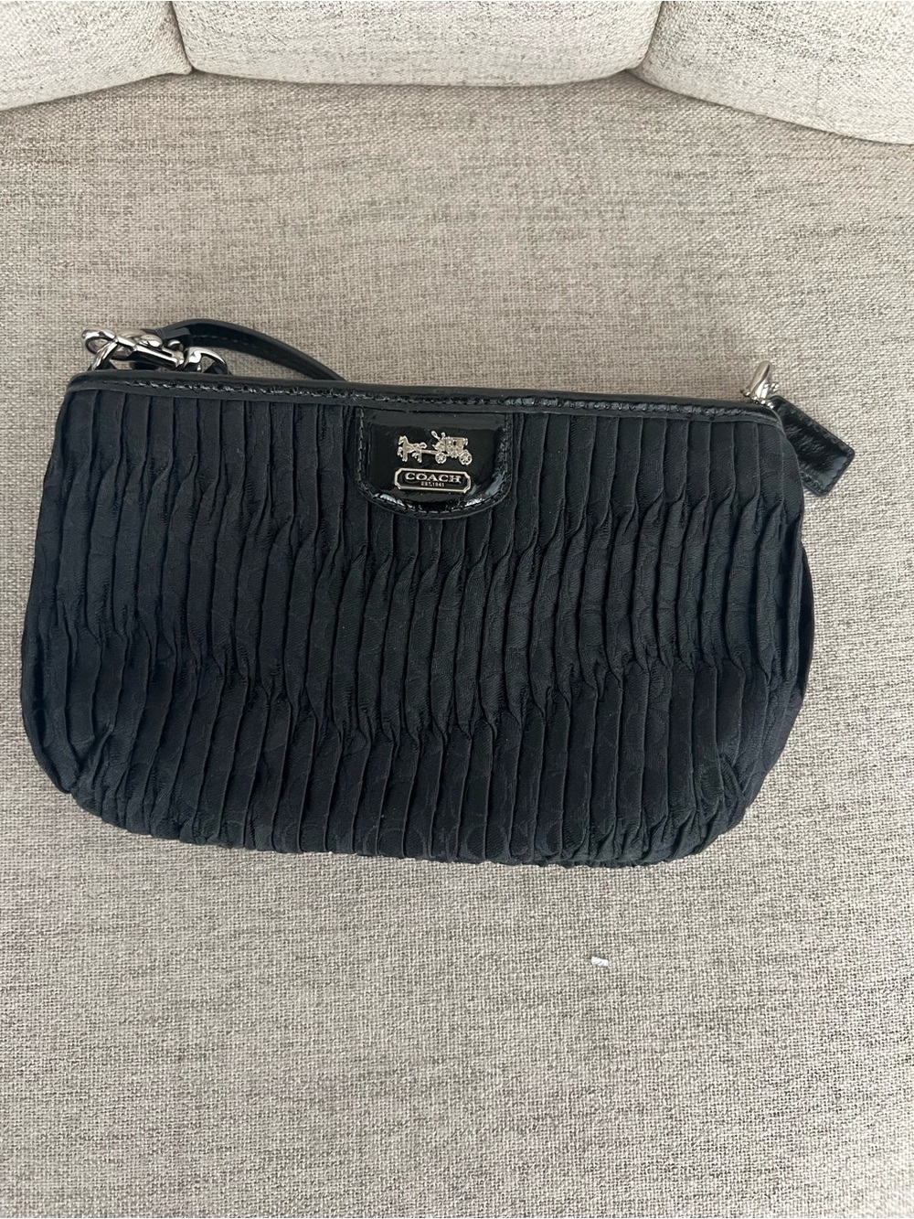 Coach Black Ruched Wristlet with Horse & Carriage Plaque